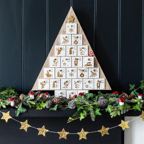 Wooden tree shaped advent calendar with gold star decorations